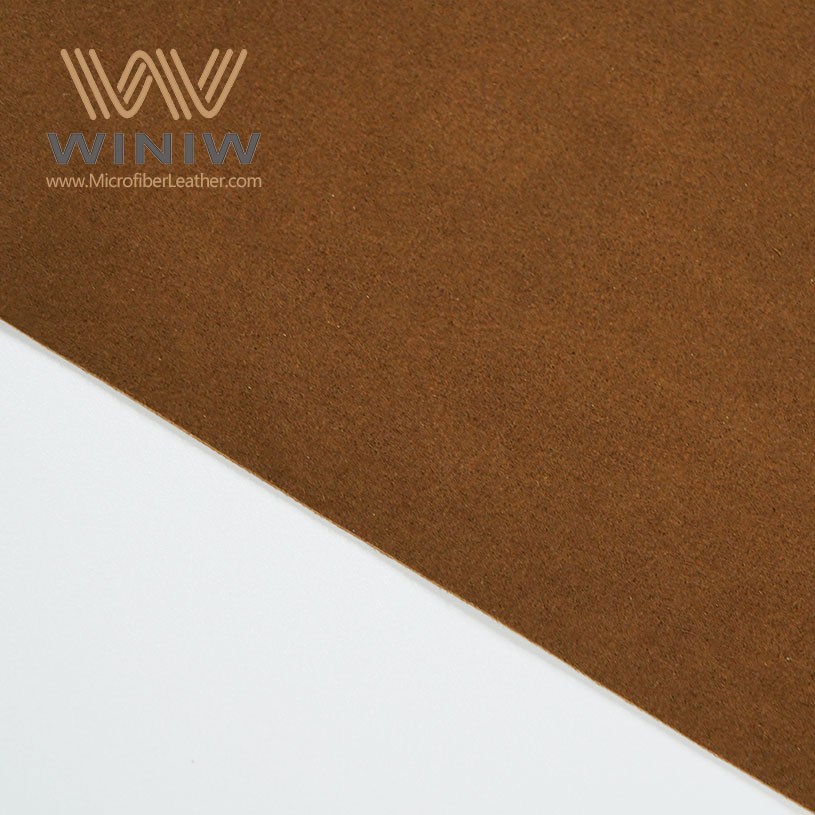 Como escolher o melhor tecido de couro sintético marrom para projetos de estofamento